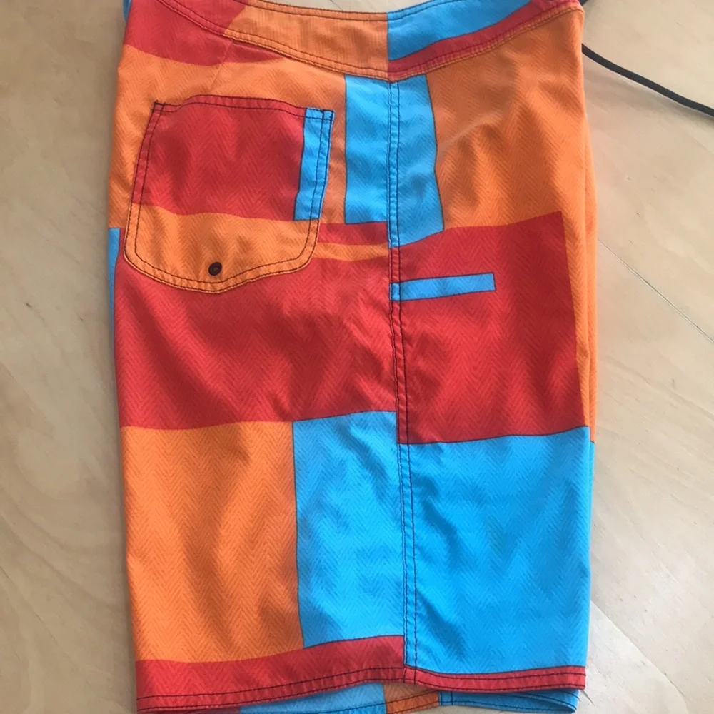 Volcom swim trunks size 33‎ orange and turquoise great condition